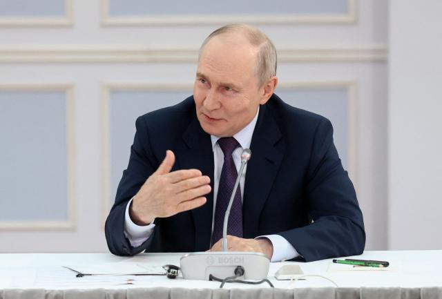 In this pool photograph distributed by the Russian state agency Sputnik, Russia's President Vladimir Putin speaks during a meeting with urban planners in Ulan-Ude on August 10, 2026. (Photo by Sergey FADEICHEV / POOL / AFP)