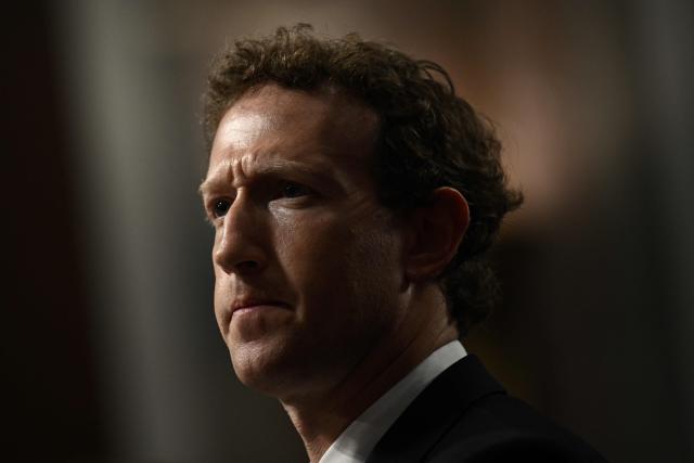 (FILES) Mark Zuckerberg, CEO of Meta, looks on during the US Senate Judiciary Committee hearing "Big Tech and the Online Child Sexual Exploitation Crisis" in Washington, DC, on January 31, 2024. Meta chief executive Mark Zuckerberg on August 10, 2026, called for lower barriers for open source AI, as his company introduced a new model that can run on a personal computer. The launch comes amid debate in the United States on whether access to the technology should be more restricted, and on local pushback against the buildout of data centers that power it. (Photo by Brendan SMIALOWSKI / AFP)