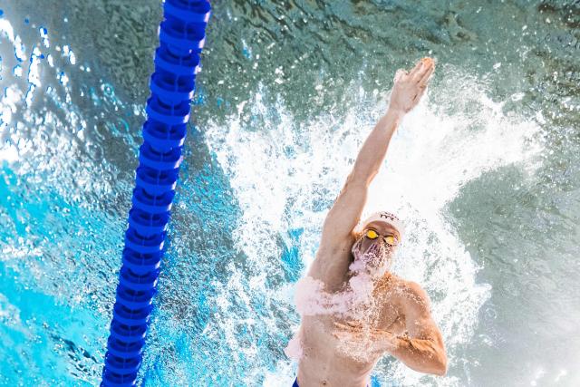 France's swimmer Leon Marchand competes in the men's 4x200m freestyle relay swimming final during the LEN European Aquatics Championships at the Olympic Aquatic Centre in Saint-Denis, northern suburbs of Paris, on August 10, 2026. (Photo by Sébastien BOZON / AFP)