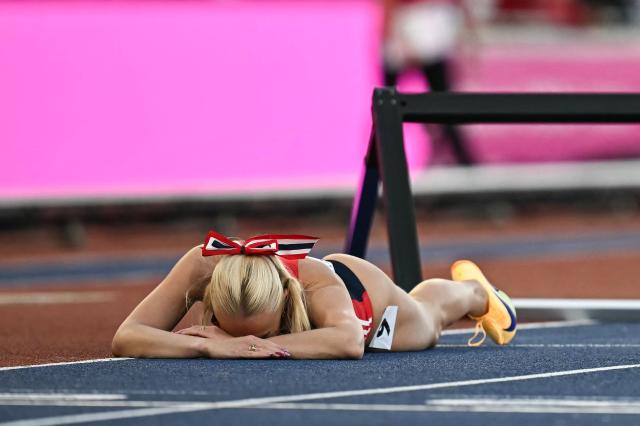 Norway's Lovise Skarbavik Andresen reacts after falling over the last hurdle while competing in the women's 100m hurdles heat 3 during the European Athletics Championships at Alexander Stadium in Birmingham on August 10, 2026. (Photo by Paul ELLIS / AFP)