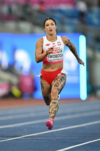 First-placed Poland's Ewa Rozanska competes in the women's 100m semi-final 3 during the European Athletics Championships at Alexander Stadium in Birmingham on August 10, 2026. (Photo by Paul ELLIS / AFP)
