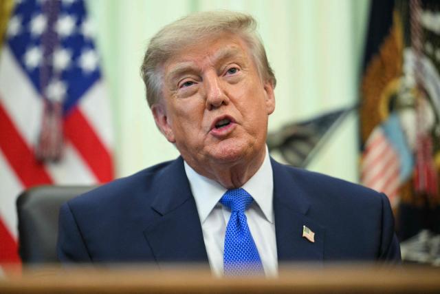 US President Donald Trump speaks before signing an executive order calling for more research and flexibility on vaccines, in the Oval Office of the White House in Washington, DC, on August 10, 2026. (Photo by Jim WATSON / AFP)