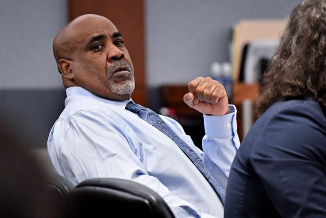 Duane Davis looks on during the first day of jury selection in his murder trial related to the 1996 killing of rapper Tupac Shakur at Clark County District Courts Regional Justice Center in Las Vegas, Nevada, on August 10, 2026. The trial of a former gang leader accused of orchestrating the murder of rapper Tupac Shakur finally began on August 10, 30 years after one of America's most high-profile unresolved killings. The proceedings, expected to last a month, will likely not make clear who fired the shots that killed the California hip-hop legend on the night of September 7, 1996, while he was in Las Vegas to see a Mike Tyson boxing match. (Photo by David Becker / POOL / AFP)