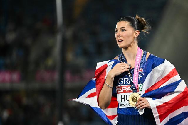 Gold medallist Britain's Amy Hunt celebrates after winning the women's 100m final during the European Athletics Championships at Alexander Stadium in Birmingham on August 10, 2026. (Photo by Paul ELLIS / AFP)