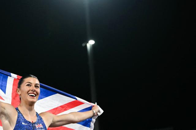 Gold medallist Britain's Amy Hunt celebrates after winning the women's 100m final during the European Athletics Championships at Alexander Stadium in Birmingham on August 10, 2026. (Photo by Paul ELLIS / AFP)