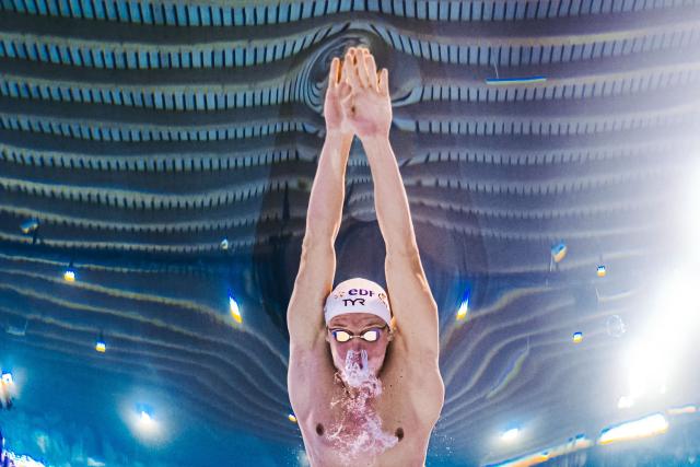 France's swimmer Leon Marchand competes in the men's 4x200m freestyle relay swimming final during the LEN European Aquatics Championships at the Olympic Aquatic Centre in Saint-Denis, northern suburbs of Paris, on August 10, 2026. (Photo by Sébastien BOZON / AFP)