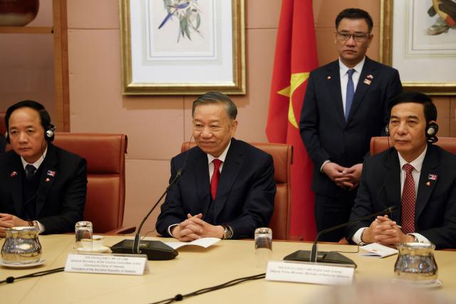 Vietnamese General Secretary and President To Lam (C) with his delegation holds talks with Australian Prime Minister Anthony Albanese (not pictured) at Parliament House in Canberra on August 11, 2026. (Photo by hilary wardhaugh / AFP)