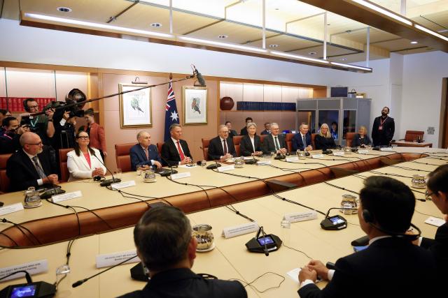 Australian Prime Minister Anthony Albanese (C) with his cabinet members holds talks with Vietnamese General Secretary and President To Lam (not pictured) at Parliament House in Canberra on August 11, 2026. (Photo by hilary wardhaugh / AFP)