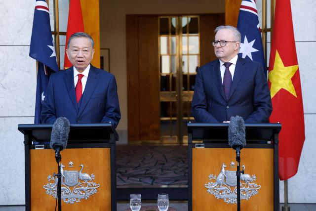 Vietnamese General Secretary and President To Lam (L) and Australian Prime Minister Anthony Albanese attend a joint press conference at Parliament House in Canberra on August 11, 2026. To Lam is visiting Australia on a four-day official visit to hold talks on bilateral and international issues. (Photo by hilary wardhaugh / AFP)