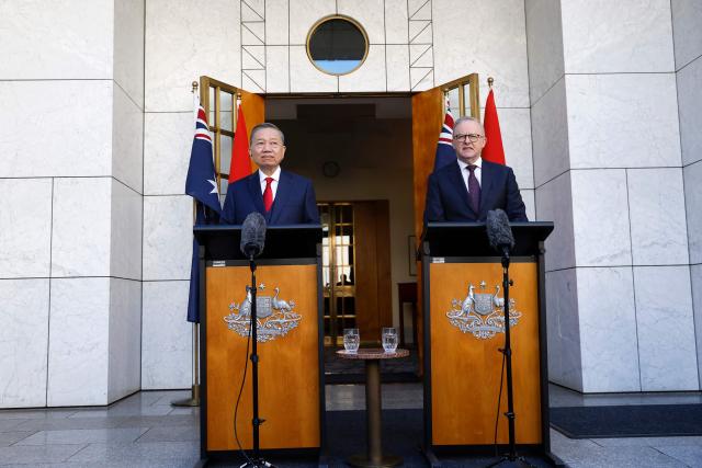 Vietnamese General Secretary and President To Lam (L) and Australian Prime Minister Anthony Albanese attend a joint press conference at Parliament House in Canberra on August 11, 2026. (Photo by hilary wardhaugh / AFP)