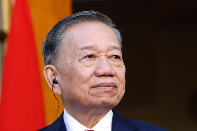 Vietnamese General Secretary and President To Lam attends a joint press conference with Australian Prime Minister Anthony Albanese (not pictured) at Parliament House in Canberra on August 11, 2026. (Photo by HILARY WARDHAUGH / AFP)