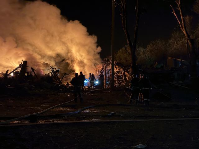 Ukrainian rescuers work at the site of a Russian airstrike in Zaporizhzhia on August 11, 2026, amid the Russian invasion of Ukraine. (Photo by Darya NAZAROVA / AFP)
