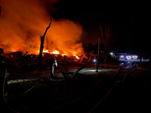 Ukrainian rescuers work at the site of a Russian strike in Zaporizhzhia on August 11, 2026, amid the Russian invasion of Ukraine. (Photo by Darya NAZAROVA / AFP)