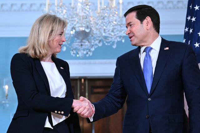 US Secretary of State Marco Rubio (R) shakes hands with Austrian Foreign Minister Beate Meinl-Reisinger as they meet at the State Department in Washington, DC, on August 11, 2026. (Photo by Mandel NGAN / AFP)