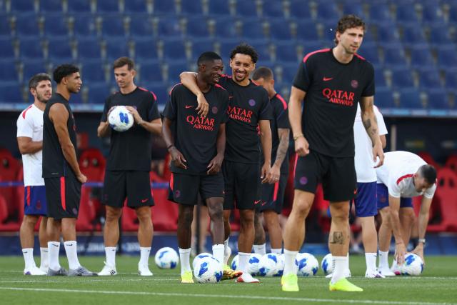 Players including Paris Saint-Germain's Brazilian defender #05 Marquinhos (C,R) and Paris Saint-Germain's French forward #10 Ousmane Dembele (C,L) attend a training session on August 11, 2026, the eve of the UEFA Supercup football match between Champions League winners Paris Saint Germain (PSG) and Europa League winners Aston Villa in Salzburg, Austria. (Photo by FRANCK FIFE / AFP)