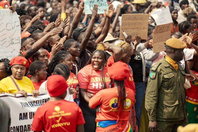 Supporters of Zambian incumbent President and United Party for National Development (UPND) presidential candidate Hakainde Hichilema sing, dance and cheer as they attend an election campaign rally in Lusaka on August 11, 2026. Tens of thousands of supporters of Zambian President Hakainde Hichilema thronged the capital Lusaka Tuesday as he made a last-ditch effort to sway undecided voters two days before the election. Hichilema, who came to power in 2021 after defeating the then-ruling Patriotic Front (PF), is seeking another five-year term in the copper-rich country of 22 million people that wants to position itself as a key player in the global green-energy transition. (Photo by GIANLUIGI GUERCIA / AFP)