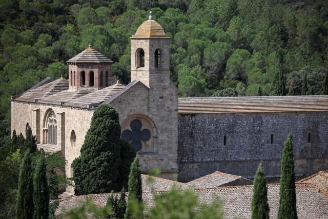 This photograph shows a view of the Cistercian Fontfroide Abbey, near Narbonne, on August 11, 2026. (Photo by Valentine CHAPUIS / AFP)