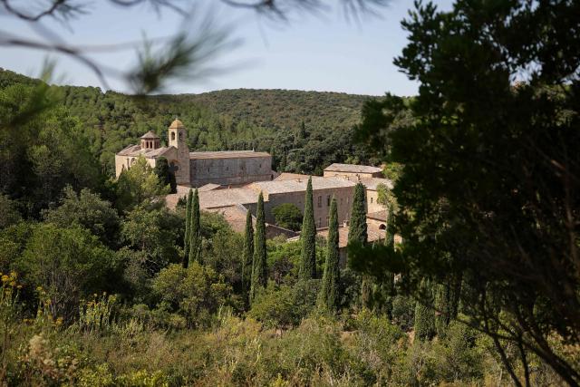 This photograph shows a view of the Cistercian Fontfroide Abbey, near Narbonne, on August 11, 2026. (Photo by Valentine CHAPUIS / AFP)