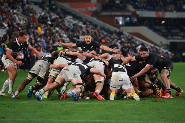 New Zealand's scrum-half Cam Roigard (C) reacts during a scrum during a rugby union tour match between The Sharks and New Zealand at Kings Park Stadium in Durban on August 11, 2026. (Photo by PHILL MAGAKOE / AFP)