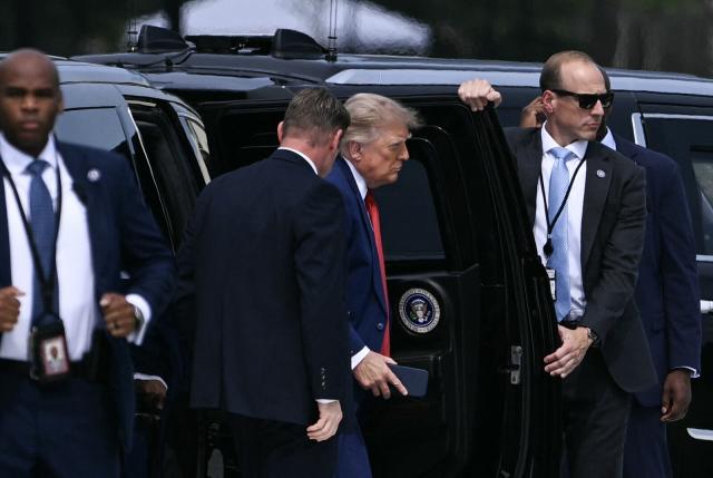 US President Donald Trump steps out of his limousine to board Marine One on the Ellipse near the White House in Washington, DC, on August 11, 2026. Trump is traveling to Geneva, Ohio, where he will attend the Patriot Games at SPIRE Academy. (Photo by Brendan SMIALOWSKI / AFP)