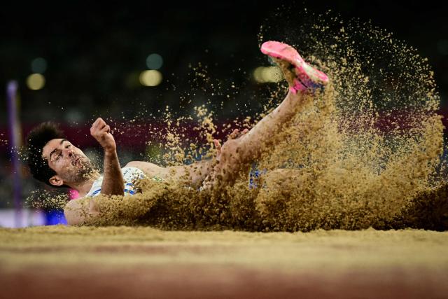 Greece's Miltiadis Tentoglou competes in the men's long jump final during the European Athletics Championships at Alexander Stadium in Birmingham on August 11, 2026. (Photo by Ben STANSALL / AFP)