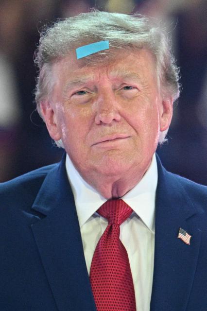 US President Donald Trump attends the 2026 Patriot Games finals at Spire Academy in Geneva, Ohio on August 11, 2026. (Photo by Jim WATSON / AFP)