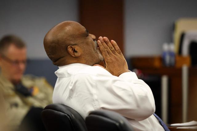 Duane Davis reacts during the second day of jury selection in his murder trial related to the 1996 killing of rapper Tupac Shakur at Clark County District Courts Regional Justice Center in Las Vegas, Nevada, on August 11, 2026. The trial of a former gang leader accused of orchestrating the murder of rapper Tupac Shakur finally began on August 10, 30 years after one of America's most high-profile unresolved killings. The proceedings, expected to last a month, will likely not make clear who fired the shots that killed the California hip-hop legend on the night of September 7, 1996, while he was in Las Vegas to see a Mike Tyson boxing match. (Photo by Daniel Cole / POOL / AFP)