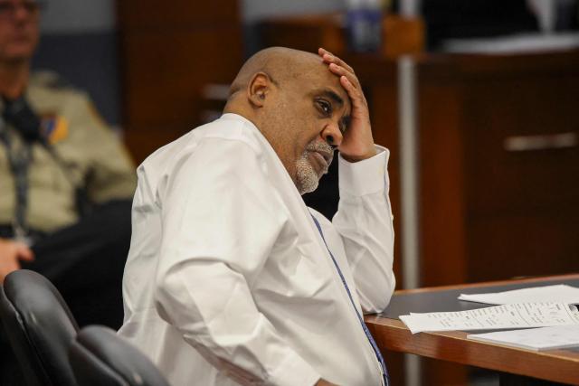 Duane Davis reacts during the second day of jury selection in his murder trial related to the 1996 killing of rapper Tupac Shakur at Clark County District Courts Regional Justice Center in Las Vegas, Nevada, on August 11, 2026. The trial of a former gang leader accused of orchestrating the murder of rapper Tupac Shakur finally began on August 10, 30 years after one of America's most high-profile unresolved killings. The proceedings, expected to last a month, will likely not make clear who fired the shots that killed the California hip-hop legend on the night of September 7, 1996, while he was in Las Vegas to see a Mike Tyson boxing match. (Photo by Daniel Cole / POOL / AFP)