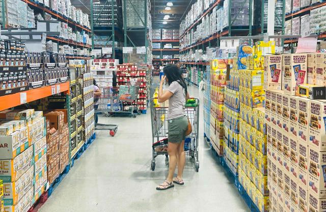 A shopper browses for food items at a wholesale retailer in Alhambra, California on August 11, 2026. Stock markets mostly rose on August 10 as investors pared their bets on an interest rate hike by the Federal Reserve that curtail growth, awaiting inflation data this week for more clues to the outlook for the world's biggest economy. (Photo by Frederic J. BROWN / AFP)