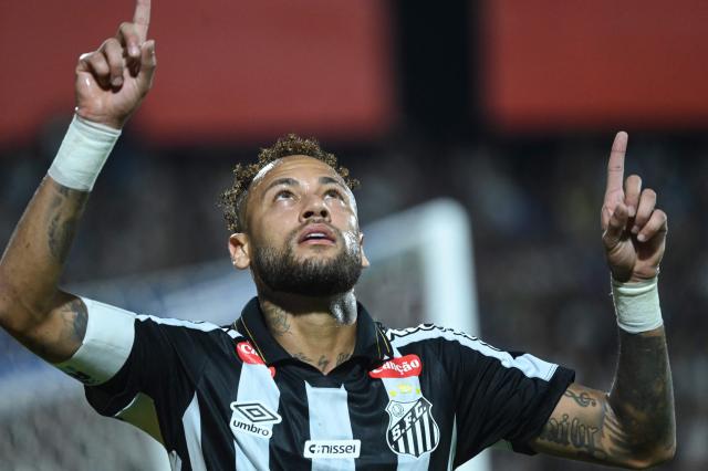 (FILES) Santos' forward #10 Neymar celebrates scoring the opening goal during the Copa Sudamericana group stage football match between Paraguay's Deportivo Recoleta and Brazil's Santos at the Rio Parapiti stadium in Pedro Juan Caballero, Paraguay, on May 5, 2026. Santos will face Ecuador's Macara in the first leg of the Copa Sudamericana round of 16 on August 14, 2026, while Neymar is being linked to Inter Miami, where two former teammates from his time at FC Barcelona play: Lionel Messi and Luis Suarez. Neymar's contract with the Brazilian club expires on December 31, and the 34-year-old forward has given no indication of his future plans. (Photo by DANIEL DUARTE / AFP)
