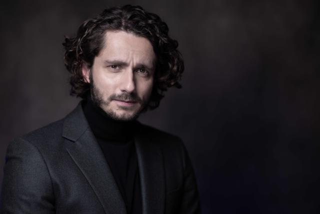 (FILES) Actor, radio host and creator of the digital media LEGEND Guillaume Pley poses during a photo session in Paris on February 6, 2026. Guillaume Pley, a prominent figure at the online media outlet Legend, has been the subject of investigations by several media outlets into his management practices and his relationships with young female fans, and the presenter responded on August 12, 2026 by filing defamation claims. (Photo by JOEL SAGET / AFP)