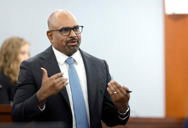 Chief Deputy District Attorney Binu Palal questions a prospective juror during the third day of jury selection in the murder trial of Duane Davis, related to the 1996 killing of rapper Tupac Shakur, at Clark County District Court Regional Justice Center in Las Vegas, Nevada, on August 12, 2026. The trial of the former gang leader accused of orchestrating the murder of rapper Tupac Shakur finally began on August 10, 30 years after one of America's most high-profile unresolved killings. The proceedings, expected to last a month, will likely not make clear who fired the shots that killed the California hip-hop legend on the night of September 7, 1996, while he was in Las Vegas to see a Mike Tyson boxing match. (Photo by Steve Marcus / POOL / AFP)