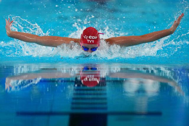 Poland's Justina Anna Kozan competes in  the final of the women's 400m individual medley swimming event during the LEN European Aquatics Championships at the Olympic Aquatic Centre in Saint-Denis, northern suburbs of Paris, on August 12, 2026. (Photo by Dimitar DILKOFF / AFP)