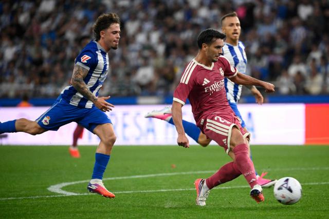 Real Madrid's Moroccan forward #21 Brahim Diaz scores the opening goal during the Teresa Herrera Trophy friendly football match between RC Deportivo de la Coruna and Real Madrid CF at Municipal de Riazor Stadium in A Coruna on August 12, 2026. (Photo by Miguel RIOPA / AFP)