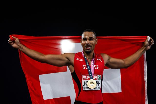Gold medallist Switzerland's Jason Joseph celebrates after winning in the men's 110m hurdles final during the European Athletics Championships at Alexander Stadium in Birmingham on August 12, 2026. (Photo by Paul ELLIS / AFP)