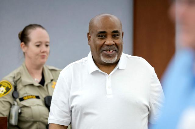 Duane Davis stands during a break in the third day of jury selection in his murder trial, related to the 1996 killing of rapper Tupac Shakur, at Clark County District Court Regional Justice Center in Las Vegas, Nevada, on August 12, 2026. The trial of the former gang leader accused of orchestrating the murder of rapper Tupac Shakur finally began on August 10, 30 years after one of America's most high-profile unresolved killings. The proceedings, expected to last a month, will likely not make clear who fired the shots that killed the California hip-hop legend on the night of September 7, 1996, while he was in Las Vegas to see a Mike Tyson boxing match. (Photo by Steve Marcus / POOL / AFP)