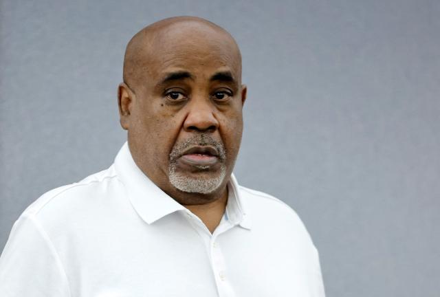 Duane Davis enters the courtroom after a break in the third day of jury selection in his murder trial, related to the 1996 killing of rapper Tupac Shakur, at Clark County District Court Regional Justice Center in Las Vegas, Nevada, on August 12, 2026. The trial of the former gang leader accused of orchestrating the murder of rapper Tupac Shakur finally began on August 10, 30 years after one of America's most high-profile unresolved killings. The proceedings, expected to last a month, will likely not make clear who fired the shots that killed the California hip-hop legend on the night of September 7, 1996, while he was in Las Vegas to see a Mike Tyson boxing match. (Photo by Steve Marcus / POOL / AFP)