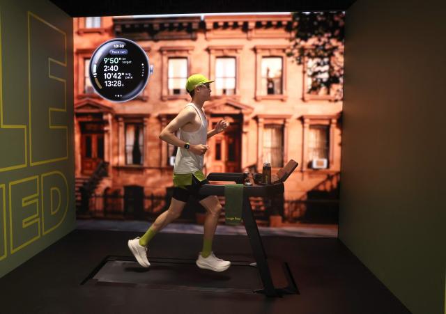 A model jogs on a treadmill showing the Google Pixel Watch 5 during the "Made by Google" product launch event in New York City on August 12, 2026. (Photo by TIMOTHY A. CLARY / AFP)