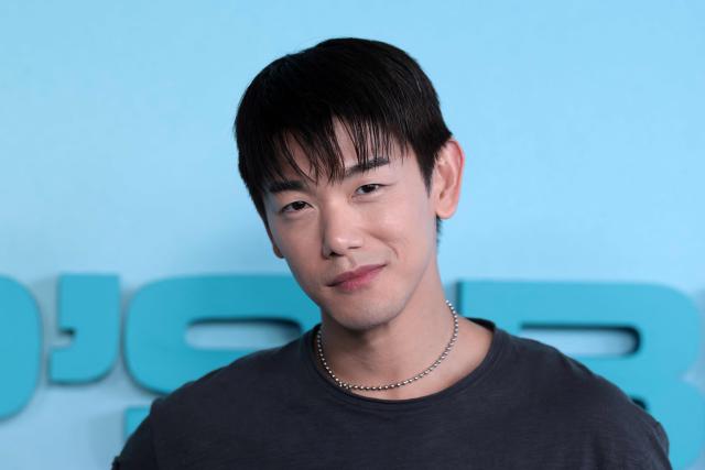 US singer/songwriter Eric Nam, of the upcoming coming-of-age musical drama film "K-Pop: The Debut", attends HYBE America's celebration of K-Pop's biggest weekend at the Grammy Museum in Los Angeles on August 12, 2026. (Photo by VALERIE MACON / AFP)