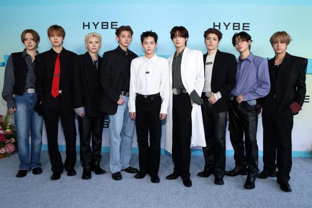 (L-R) Members of the Japanese boy band "&Team" Fuma, EJ, Yuma, Jo, Harua, K, Maki, Nicholas and Taki attend HYBE America's celebration of K-Pop's biggest weekend at the Grammy Museum in Los Angeles on August 12, 2026. (Photo by VALERIE MACON / AFP)