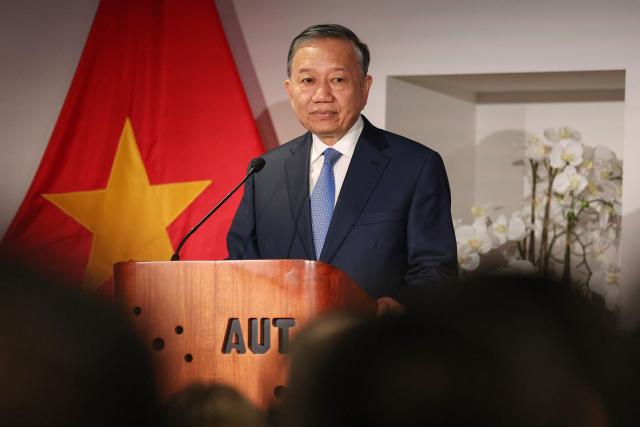 Vietnam's President To Lam delivers a speech at Auckland University of Technology on August 13, 2026. (Photo by Michael Bradley / AFP)