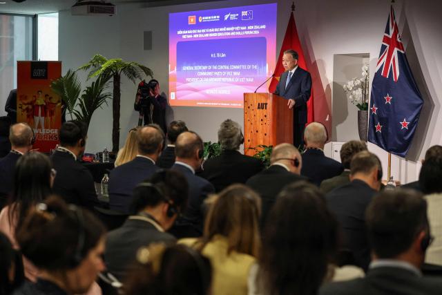 Vietnam's President To Lam delivers a speech at Auckland University of Technology on August 13, 2026. (Photo by Michael Bradley / AFP)
