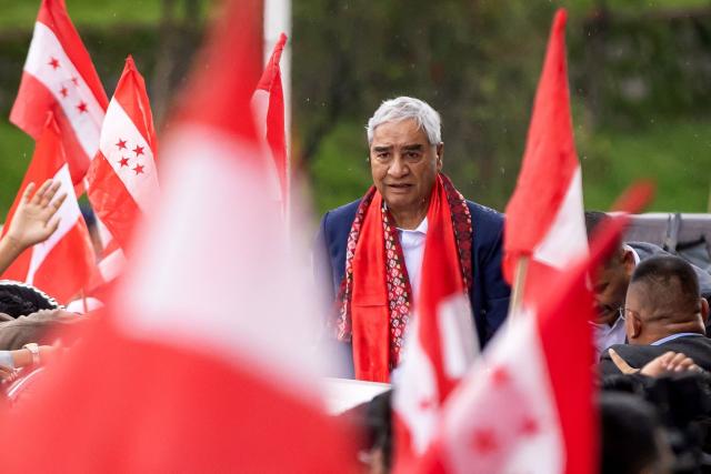 Former Nepal's prime minister Sher Bahadur Deuba reacts upon his arrival in Kathmandu on August 13, 2026. Deuba, facing arrest for alleged corruption, returned home on August 13, six months after leaving for medical treatment abroad. (Photo by Prabin Ranabhat / AFP)