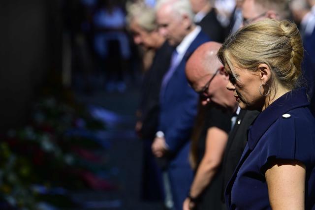 President of the Bundestag Julia Kloeckner (R) and Berlin's mayor Kai Wegner attend the Central Commemorative Ceremony of the State of Berlin and the Federal Government on the 65th Anniversary of the Construction of the Berlin Wall on August 13, 2026. (Photo by John MACDOUGALL / AFP)