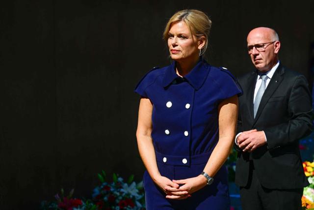 President of the Bundestag Julia Kloeckner and Berlin's mayor Kai Wegner attend the Central Commemorative Ceremony of the State of Berlin and the Federal Government on the 65th Anniversary of the Construction of the Berlin Wall on August 13, 2026. (Photo by John MACDOUGALL / AFP)