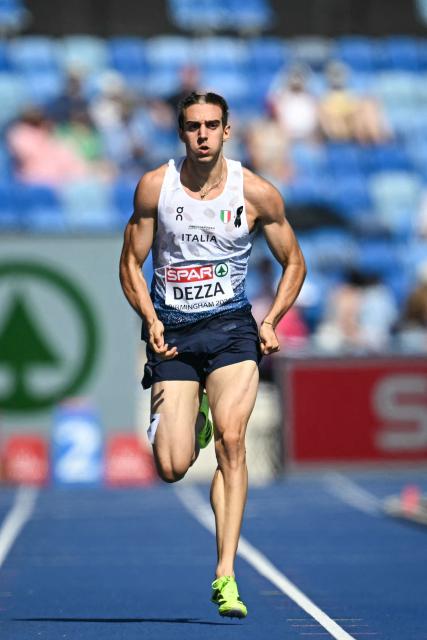 First-placed Italy's Filippo Dezza competes in the men's 200m heats during the European Athletics Championships at Alexander Stadium in Birmingham on August 13, 2026. (Photo by Paul ELLIS / AFP)