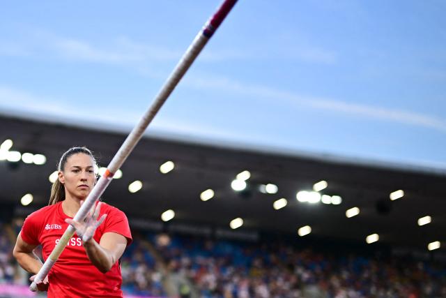 Switzerland's Angelica Moser warms up prior to compete in the women's pole vault final during the European Athletics Championships at Alexander Stadium in Birmingham on August 13, 2026. (Photo by Ben STANSALL / AFP)
