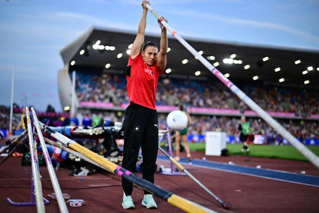 Switzerland's Angelica Moser warms up prior to compete in the women's pole vault final during the European Athletics Championships at Alexander Stadium in Birmingham on August 13, 2026. (Photo by Ben STANSALL / AFP)
