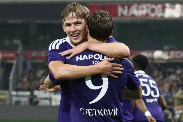 Anderlecht's Ukranian forward #14 Danylo Sikan (L) celebrates after scoring a goal during the UEFA Europa League third qualifying round - second leg football match between RSC Anderlecht and PAOK Thessaloniki at Lotto Park in Brussels on August 13, 2026. (Photo by BRUNO FAHY / Belga / AFP) / Belgium OUT