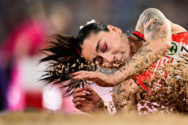 Turkey's Tugba Danismaz competes in the women's triple jump final during the European Athletics Championships at Alexander Stadium in Birmingham on August 13, 2026. (Photo by Ben STANSALL / AFP)